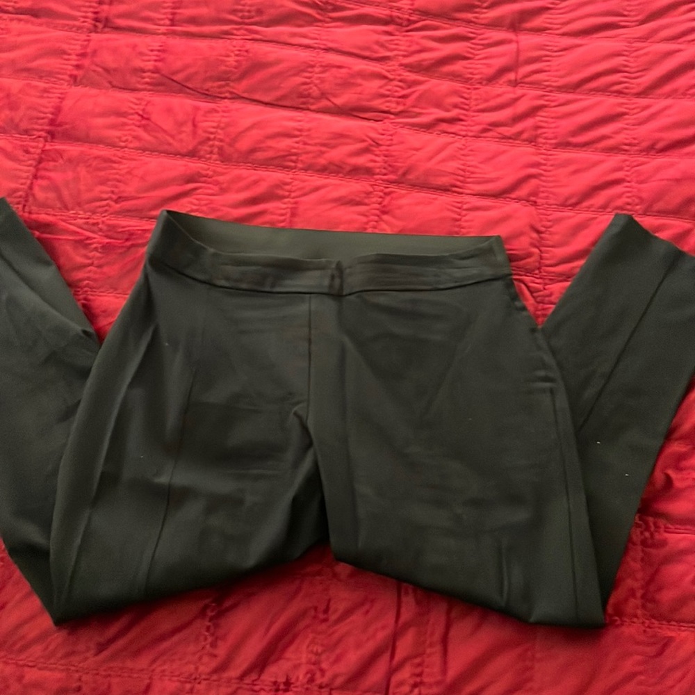 Slim fit black pants.